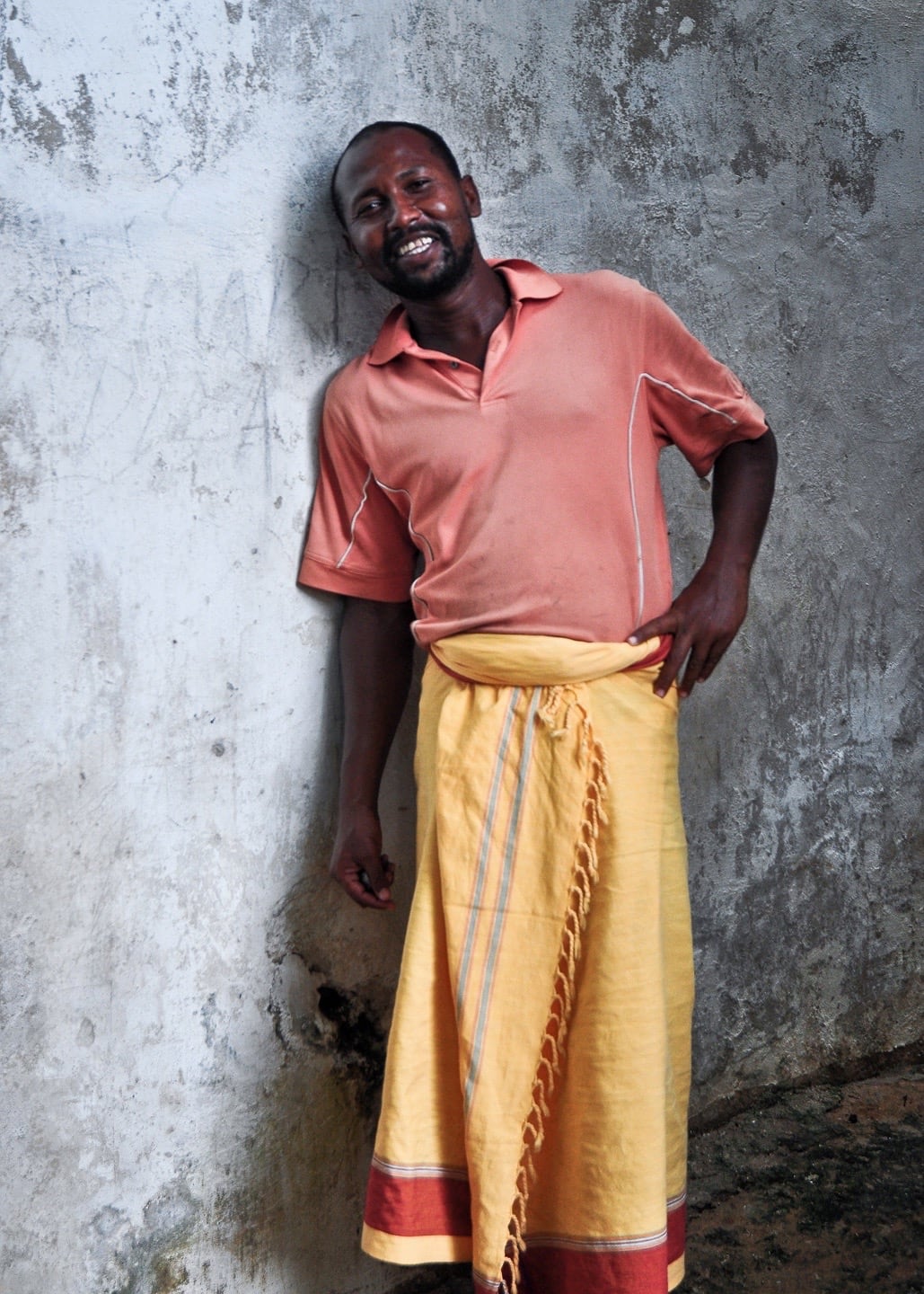 man in Shela wearing kanga