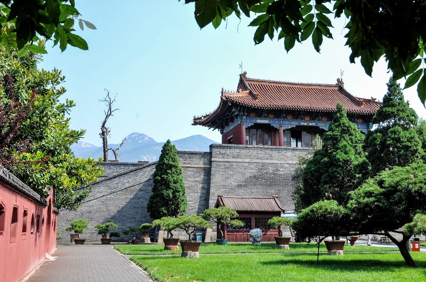 Chinese temple and a garden surrounded by trees