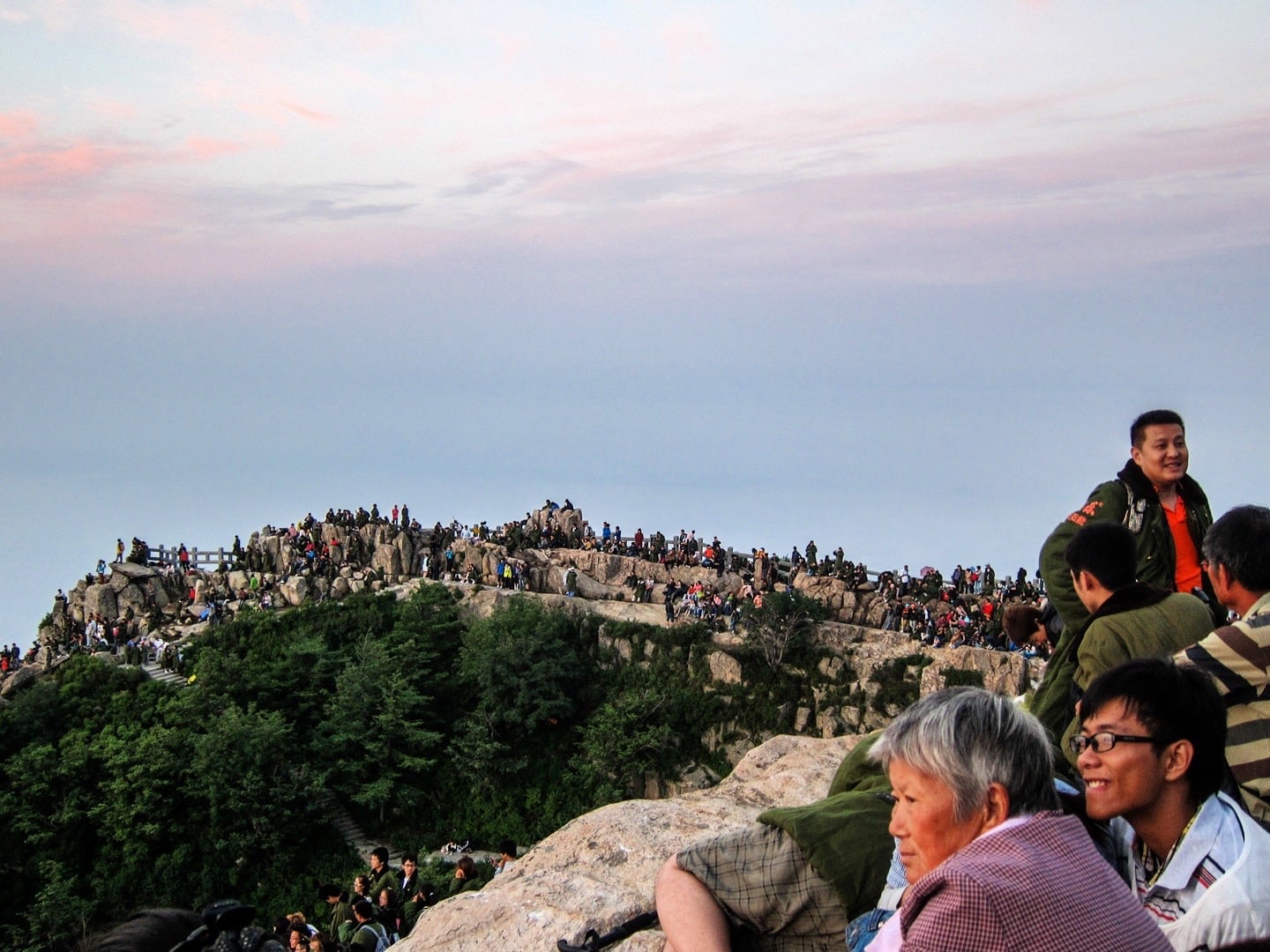 People watching sunrise in China on Taishan Mountain