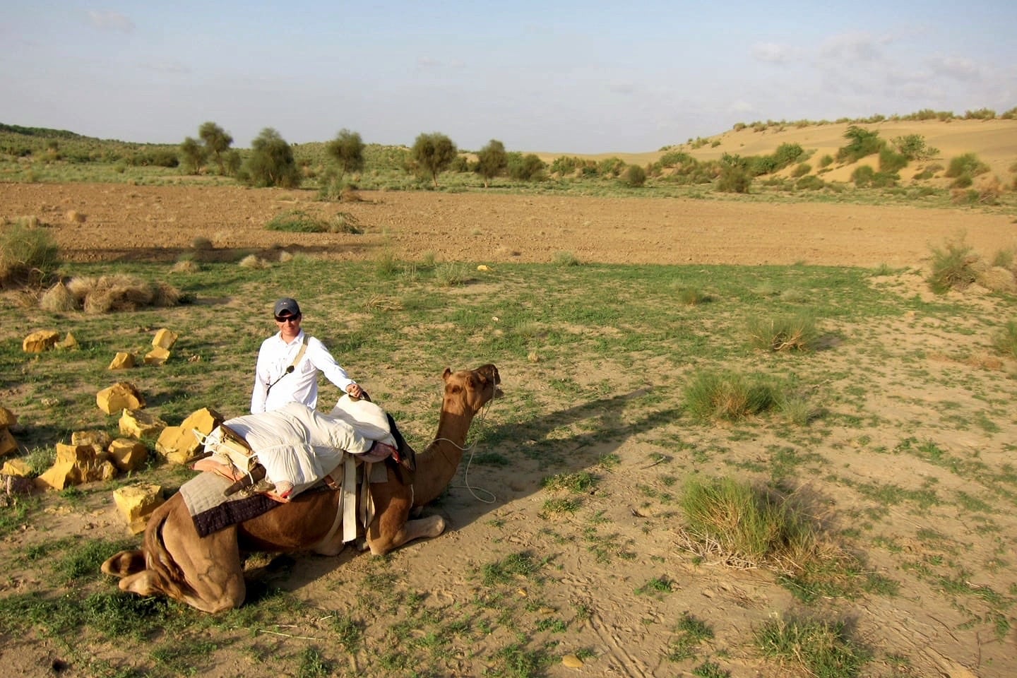 man and camel in the Thar Desert