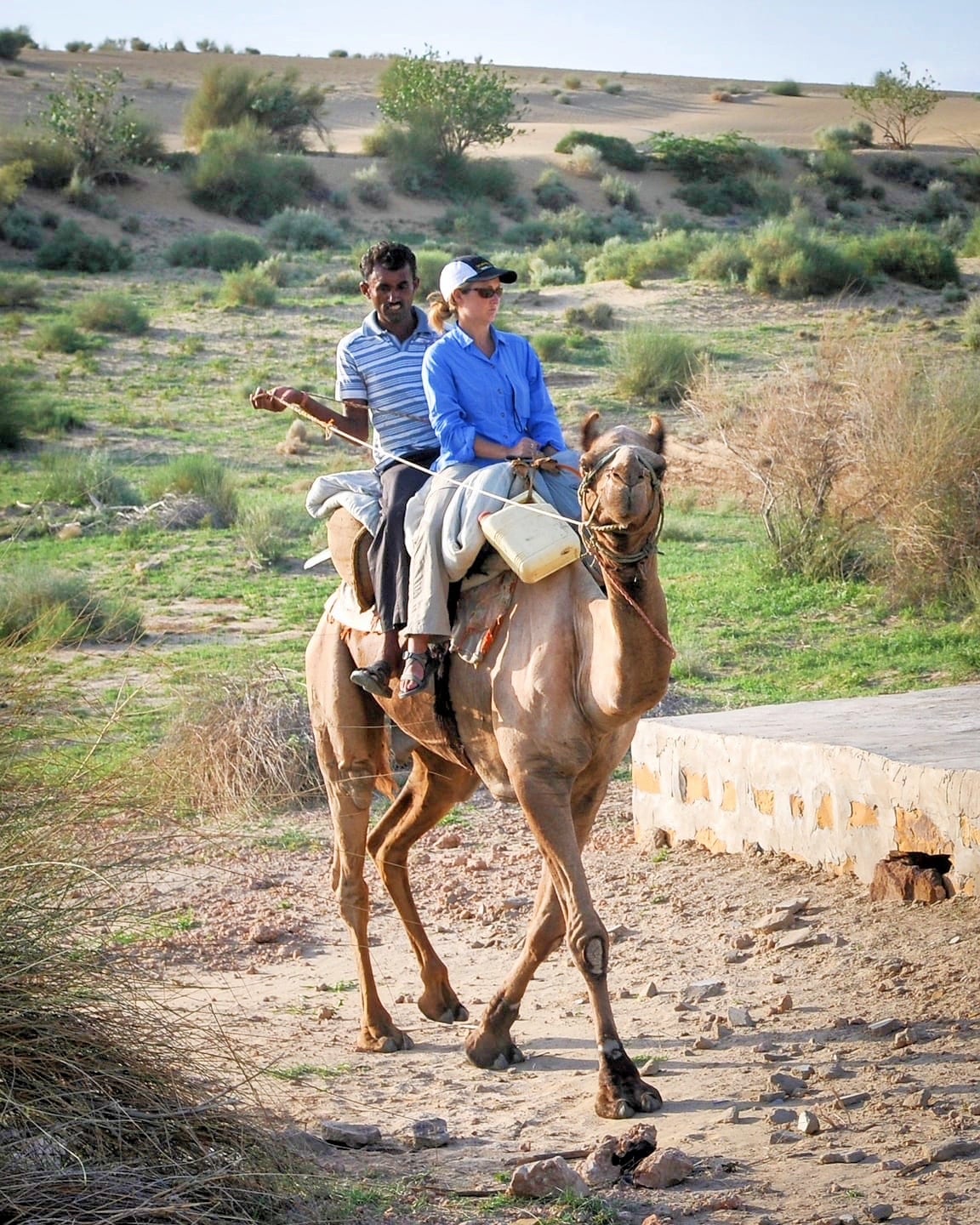 woman and camel driver in the Thar Desert