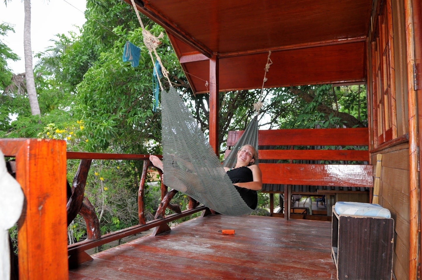 swinging on a hammock in a beach hut