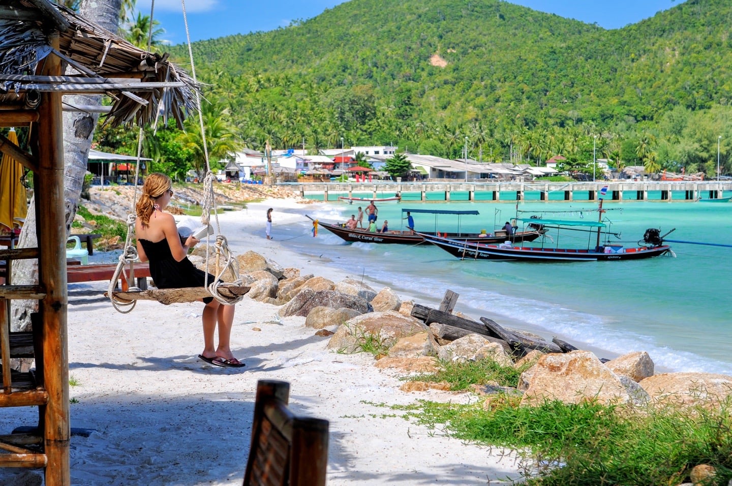 long tail boats in harbor in Thailand