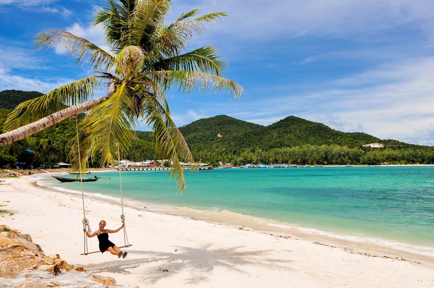 woman on palm swing in Thailand