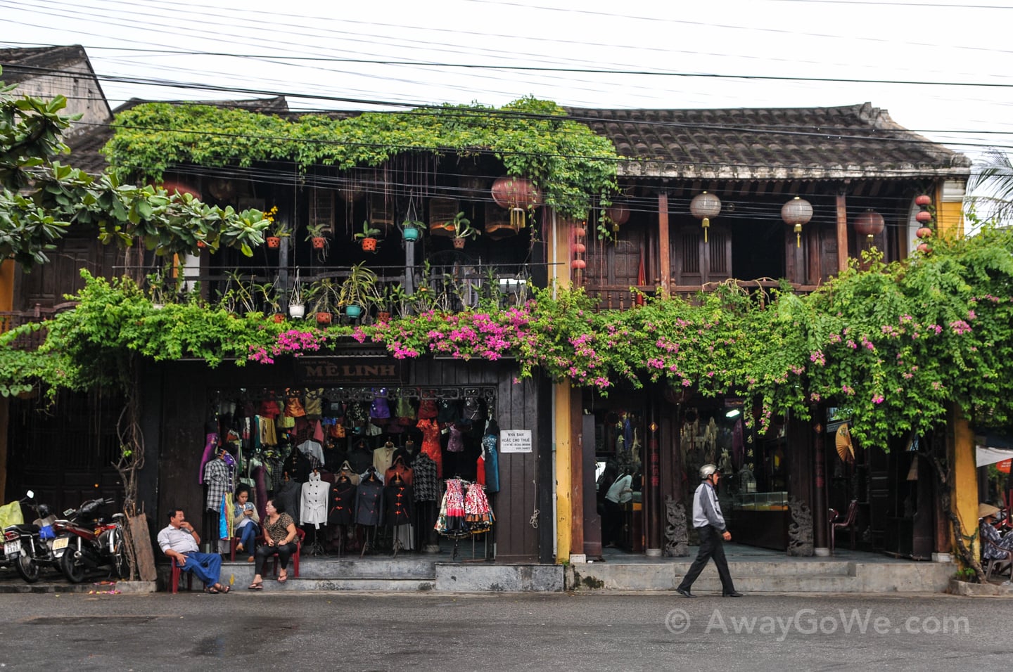 hanging flowers and historic buildings in Hoi An Ancient Town