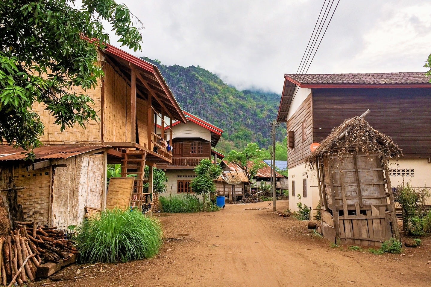 village with unsealed road and houses