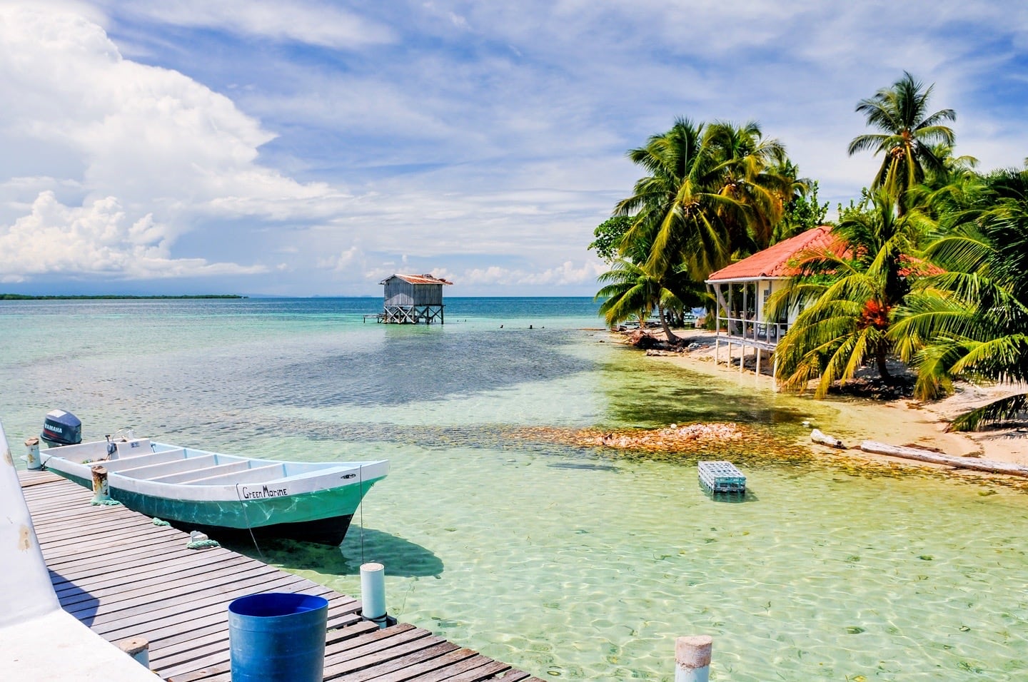 Tobacco Caye dock and Caribbean waters