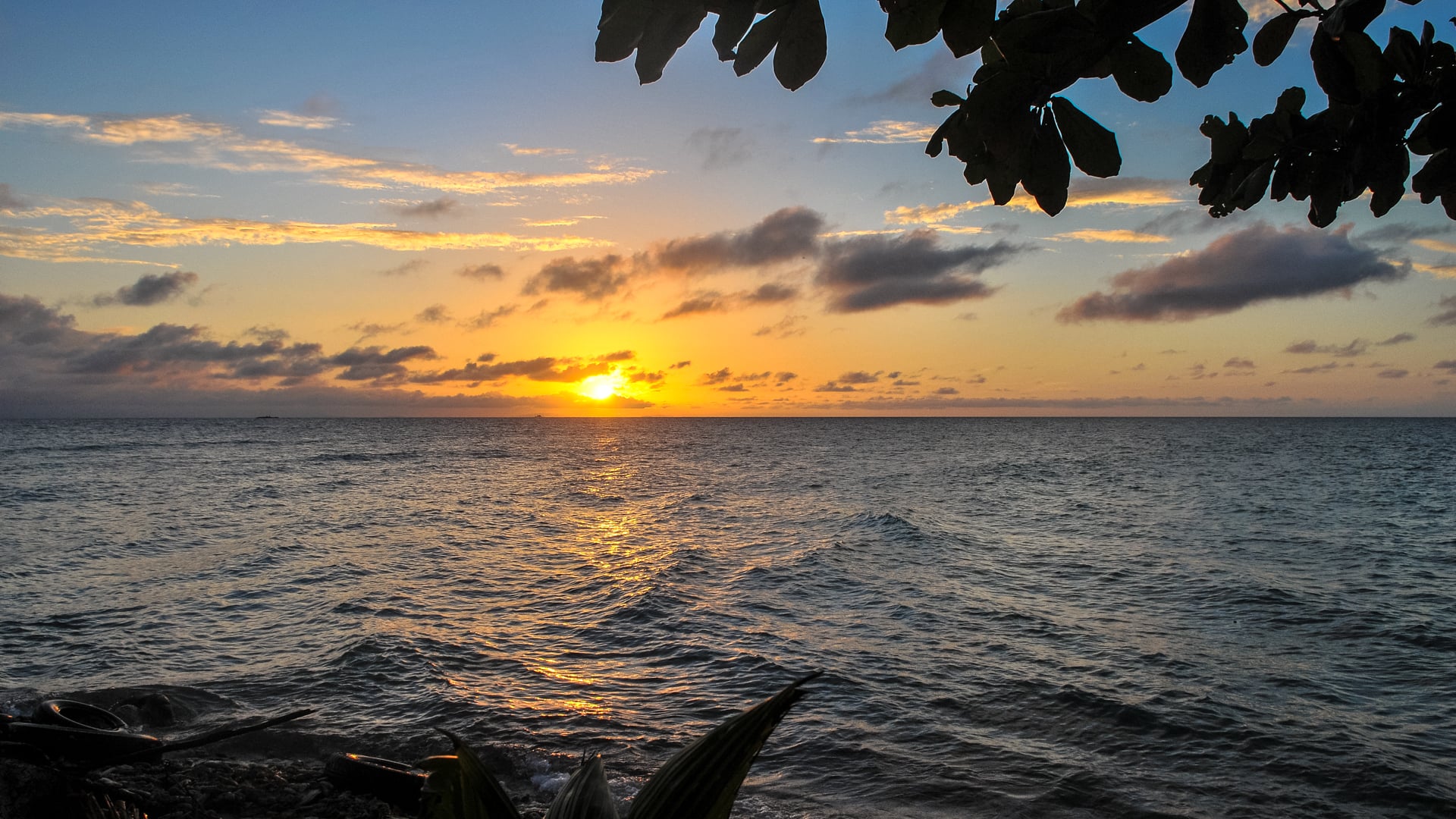 Lime Caye Sapodilla Cayes Belize sunset