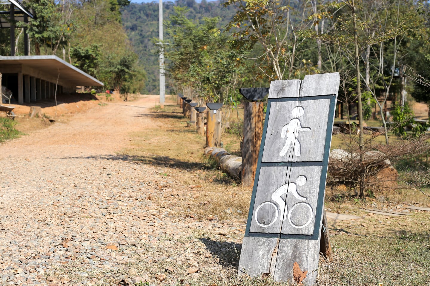 walking and biking trail sign at Wealth Coffee