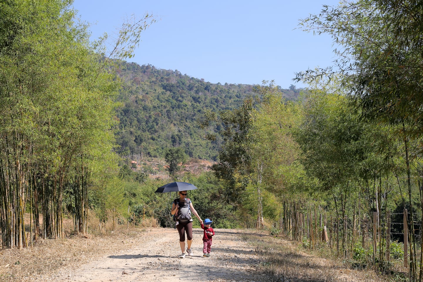 mother and children walking trail