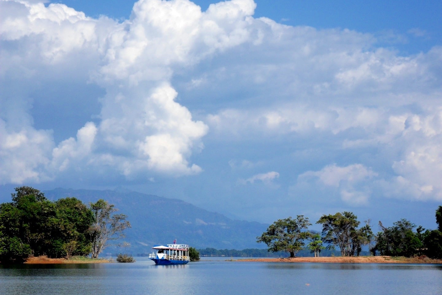 tour boat on lake in Laos