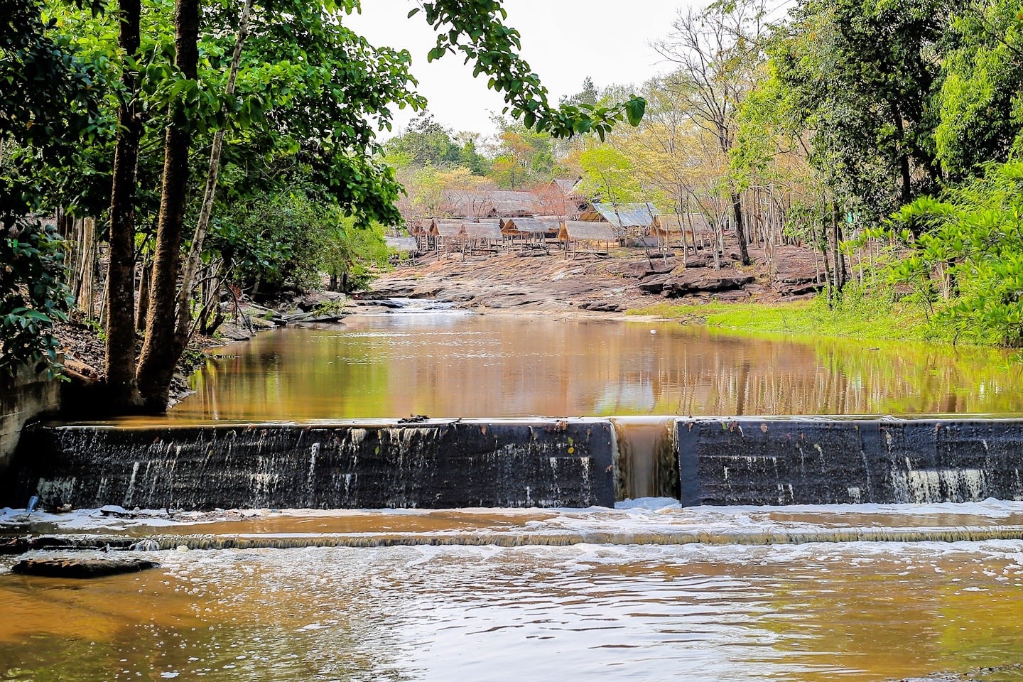 waterfall and restaurant huts