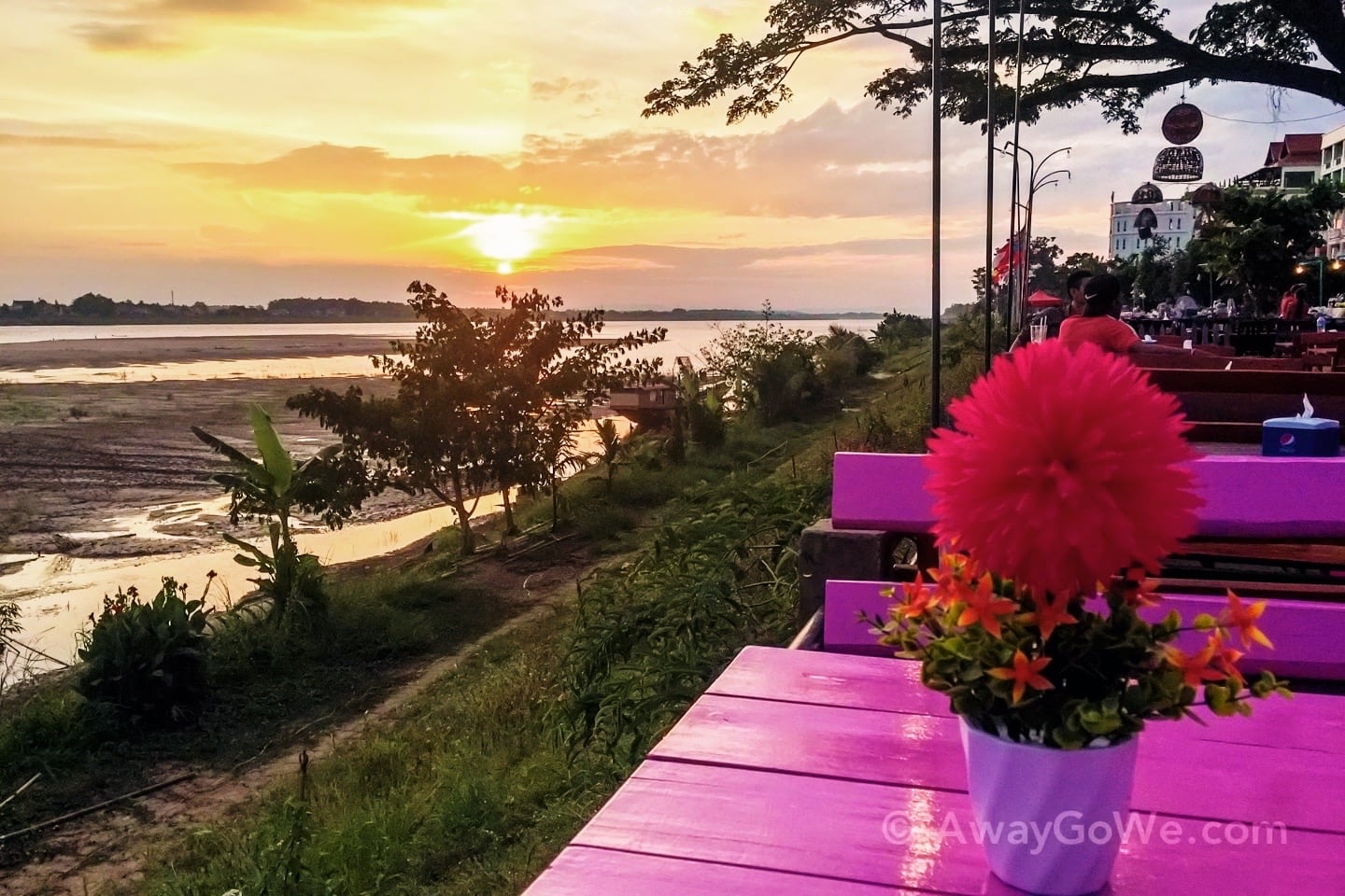 sun setting over mekong