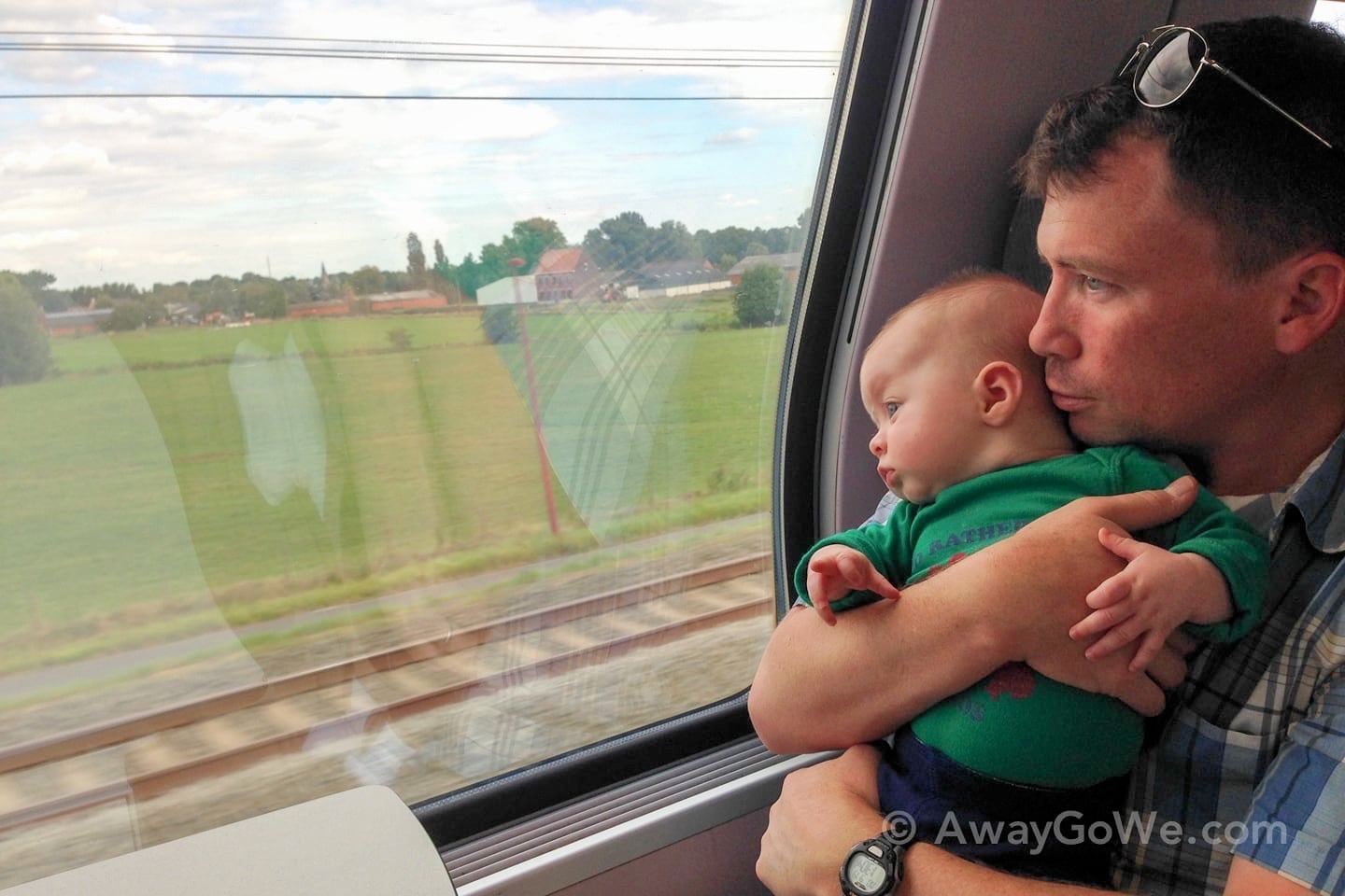 baby and father on train