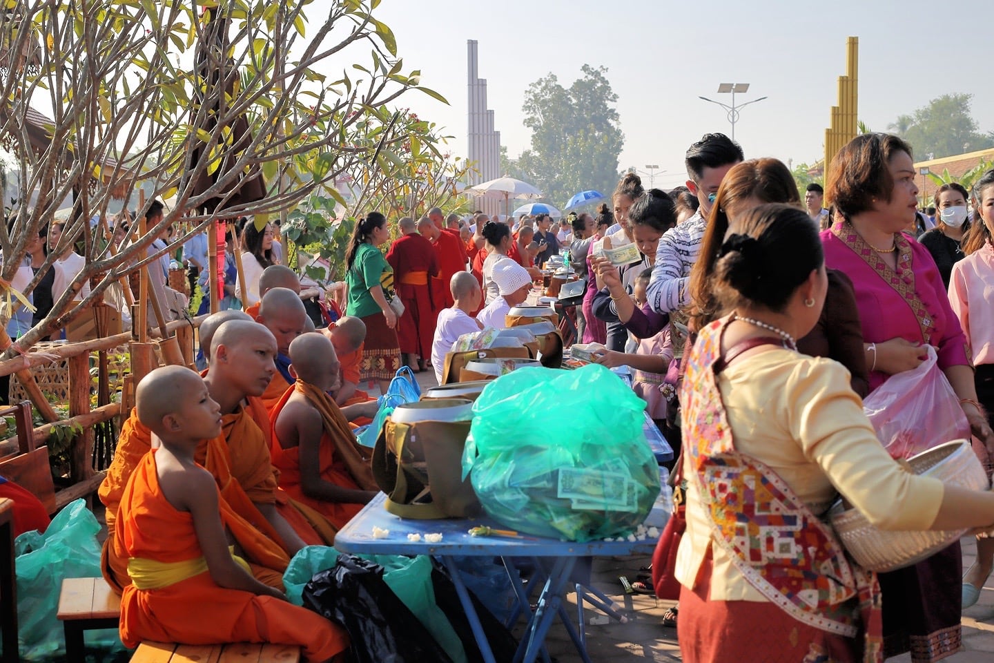 Buddhist monks receiving alms