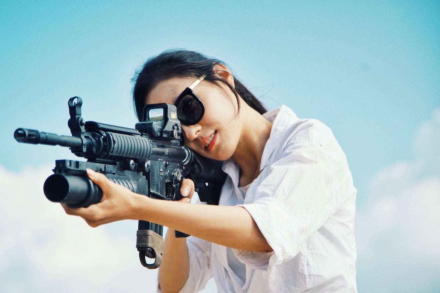 woman aiming at a target