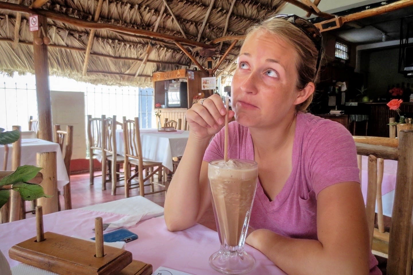 woman drinking chocolate shake at Happy Fish coffee