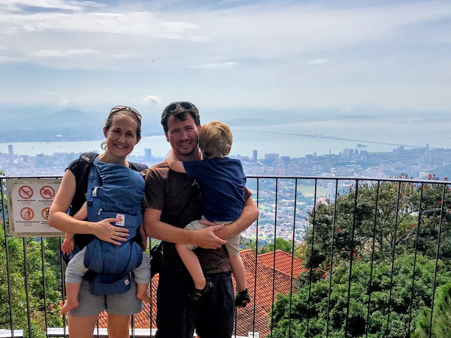 couple and young children on a viewing platform