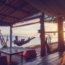 digital nomad gear packing list man on hammock