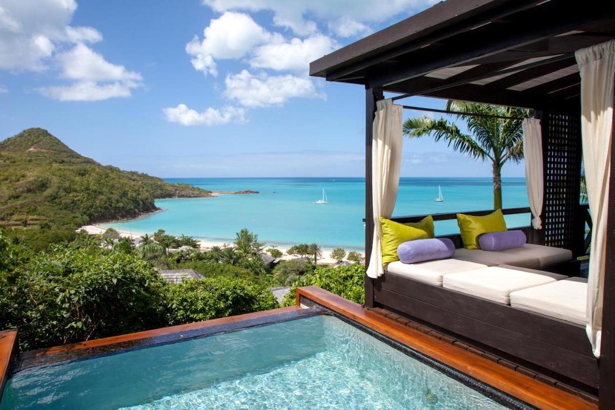 poolside bed overlooking azure sea