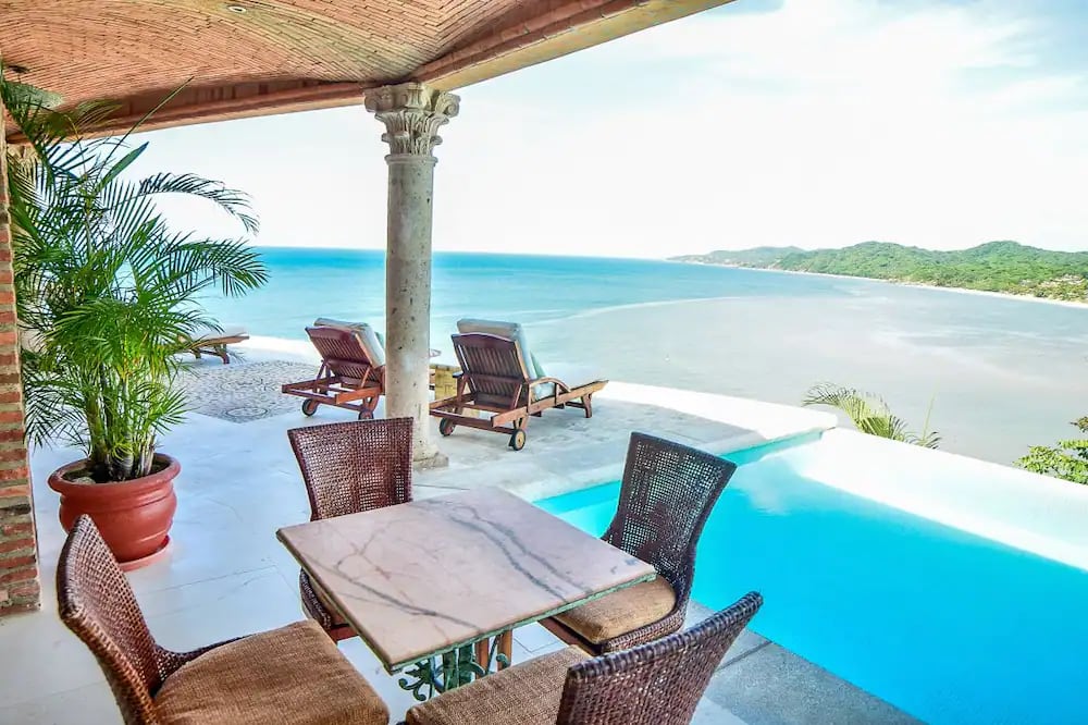 table and chairs with a view of the Pacific from one of the best hotels in Sayulita