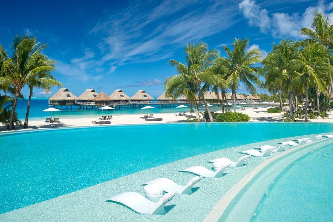 swimming pool and tropical beach