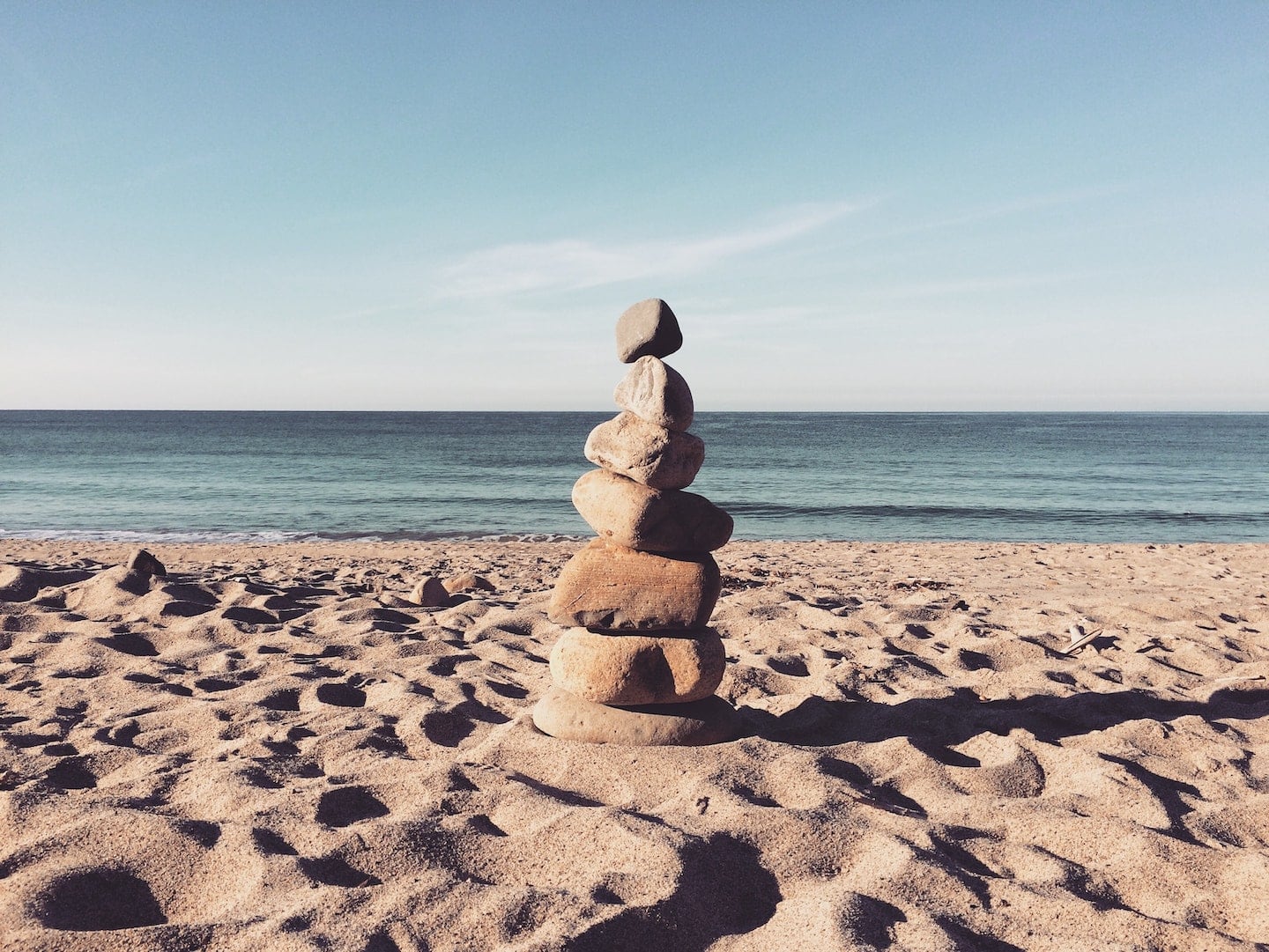 rocks stacked on beach