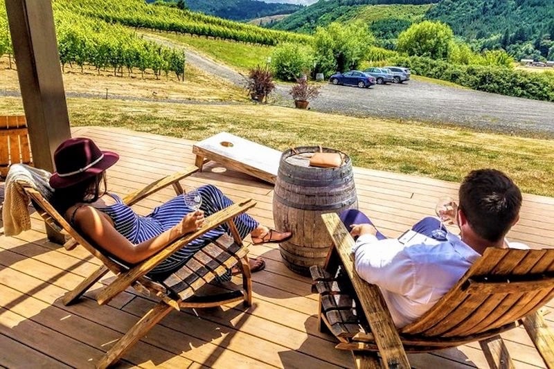 couple enjoying wine Willamette Valley wine tours