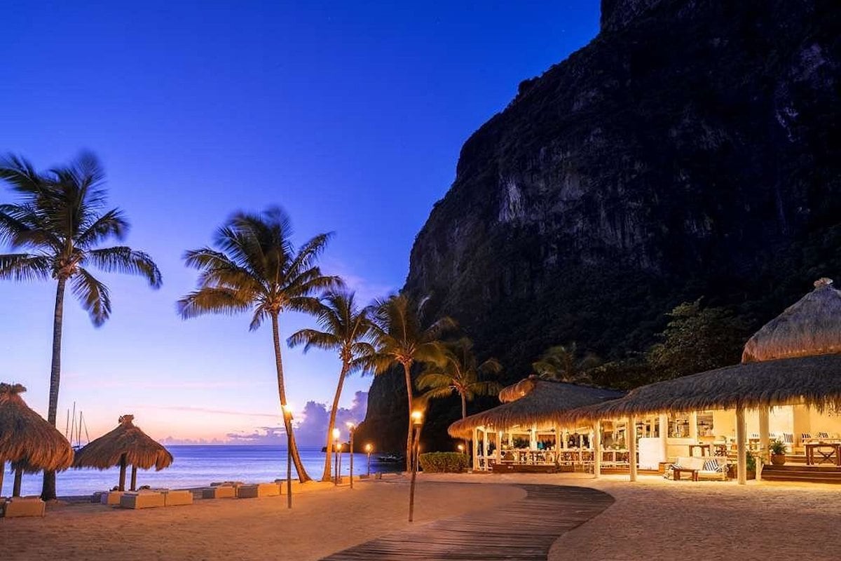 beach sunset tropical palms and mountain