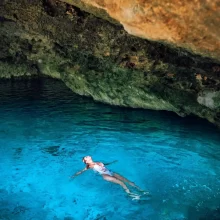 woman in water Tulum cenotes