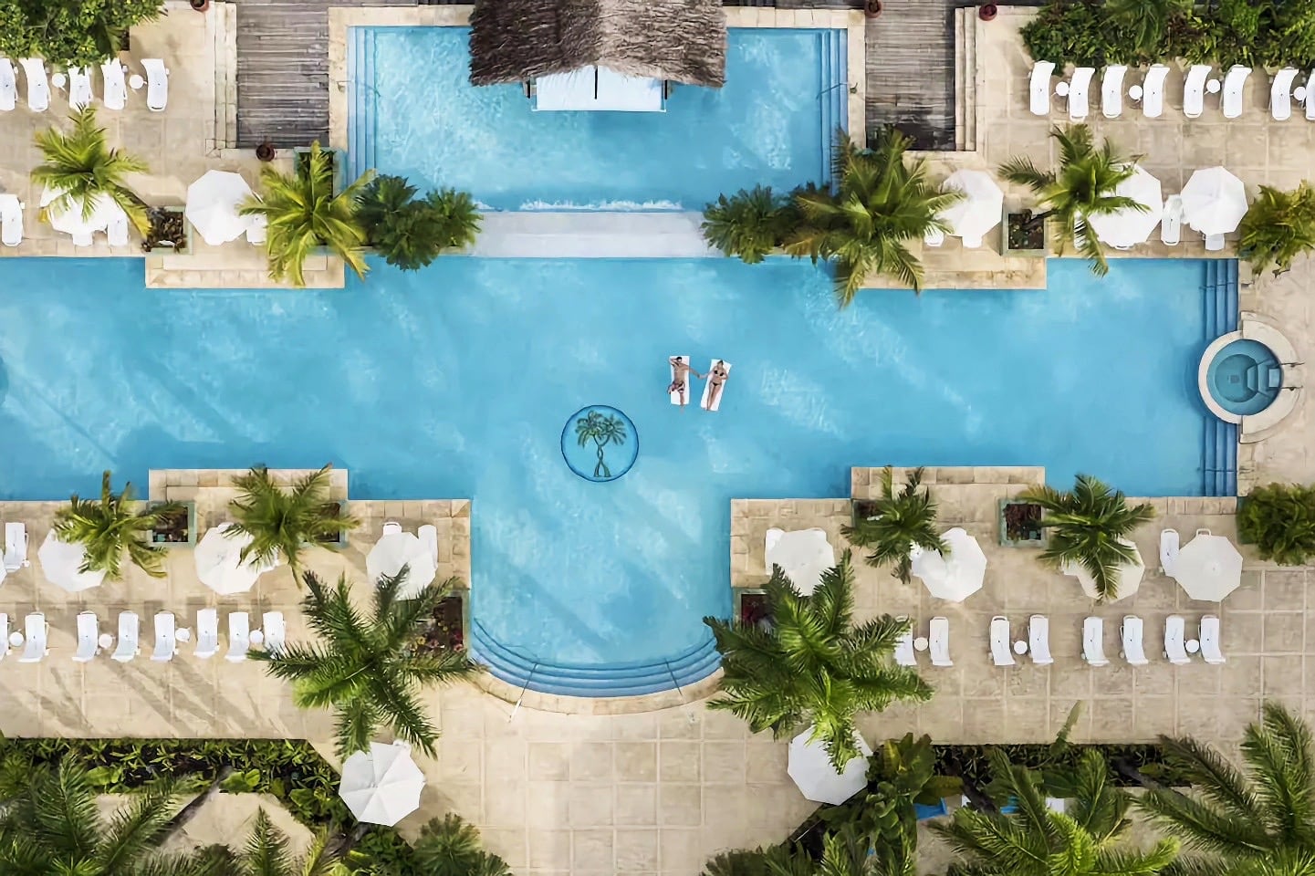 aerial view of large pool at beach resort