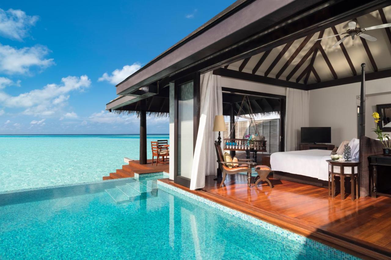 luxury hotel room with private pool overlooking ocean