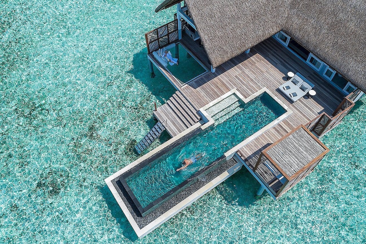 large Maldives on-water villa surrounded by sea