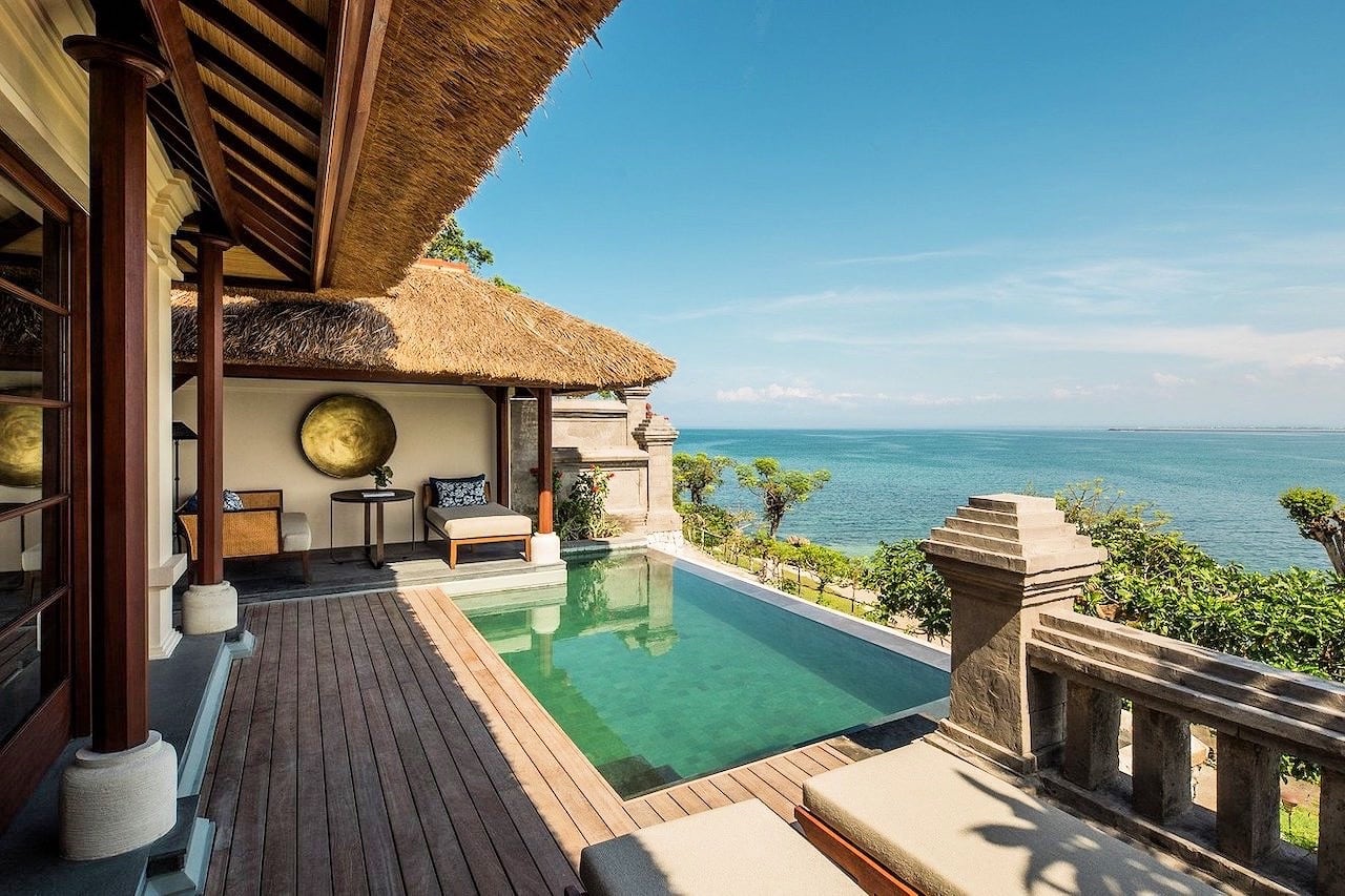luxury resort suite with pool and ocean view