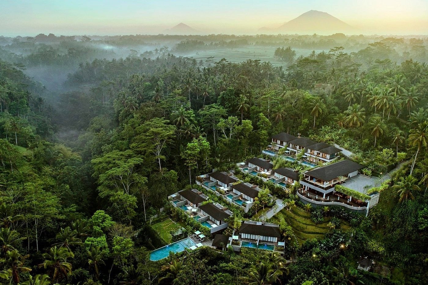 luxury resort in forest with volcano
