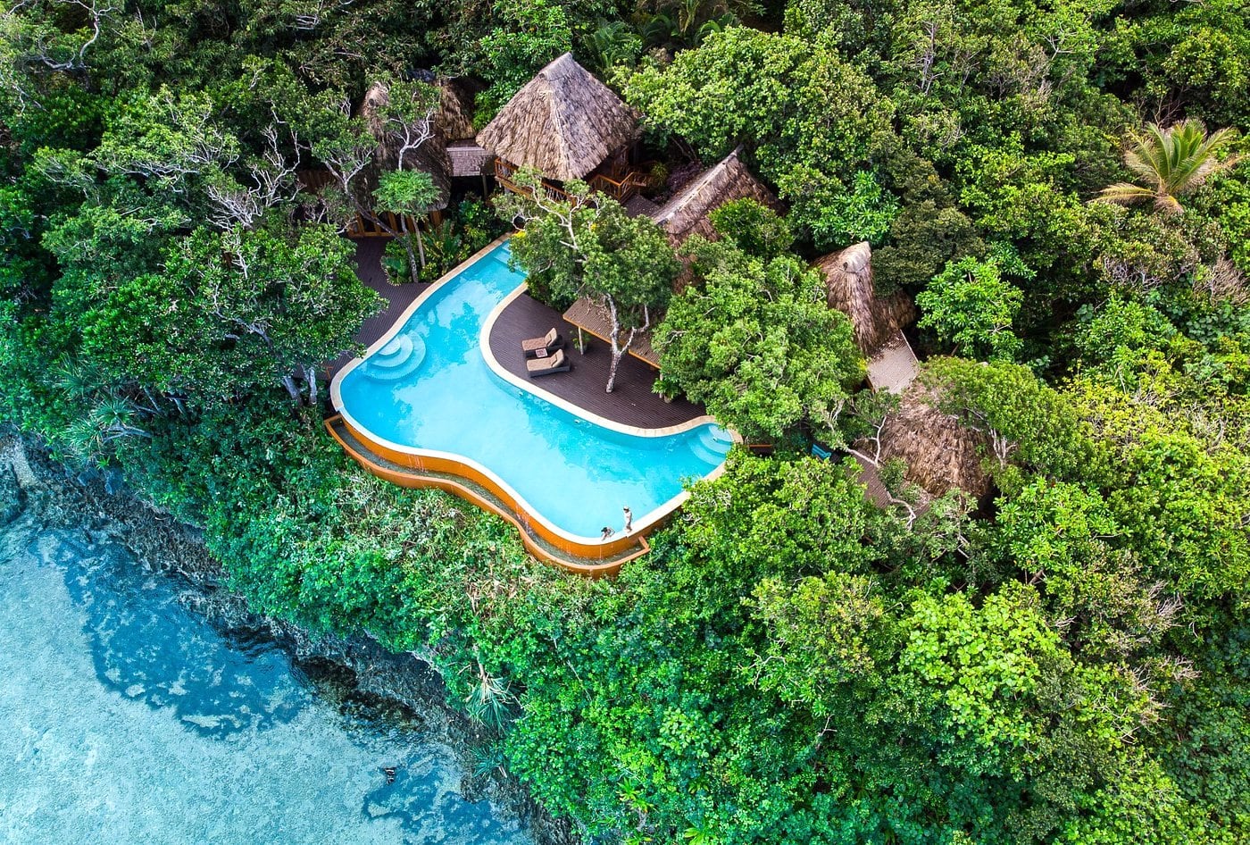 luxury resort surrounded by tropical forest