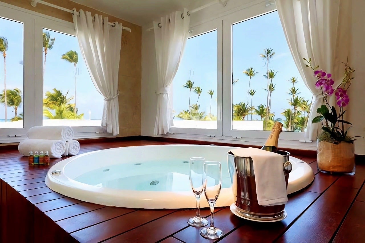 jacuzzi tub with champagne and a view