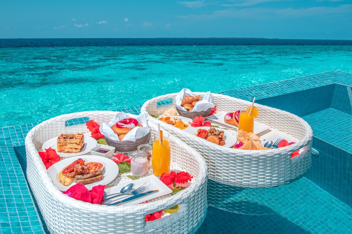 brunch basket floating in infinity pool Maldives all inclusive resorts
