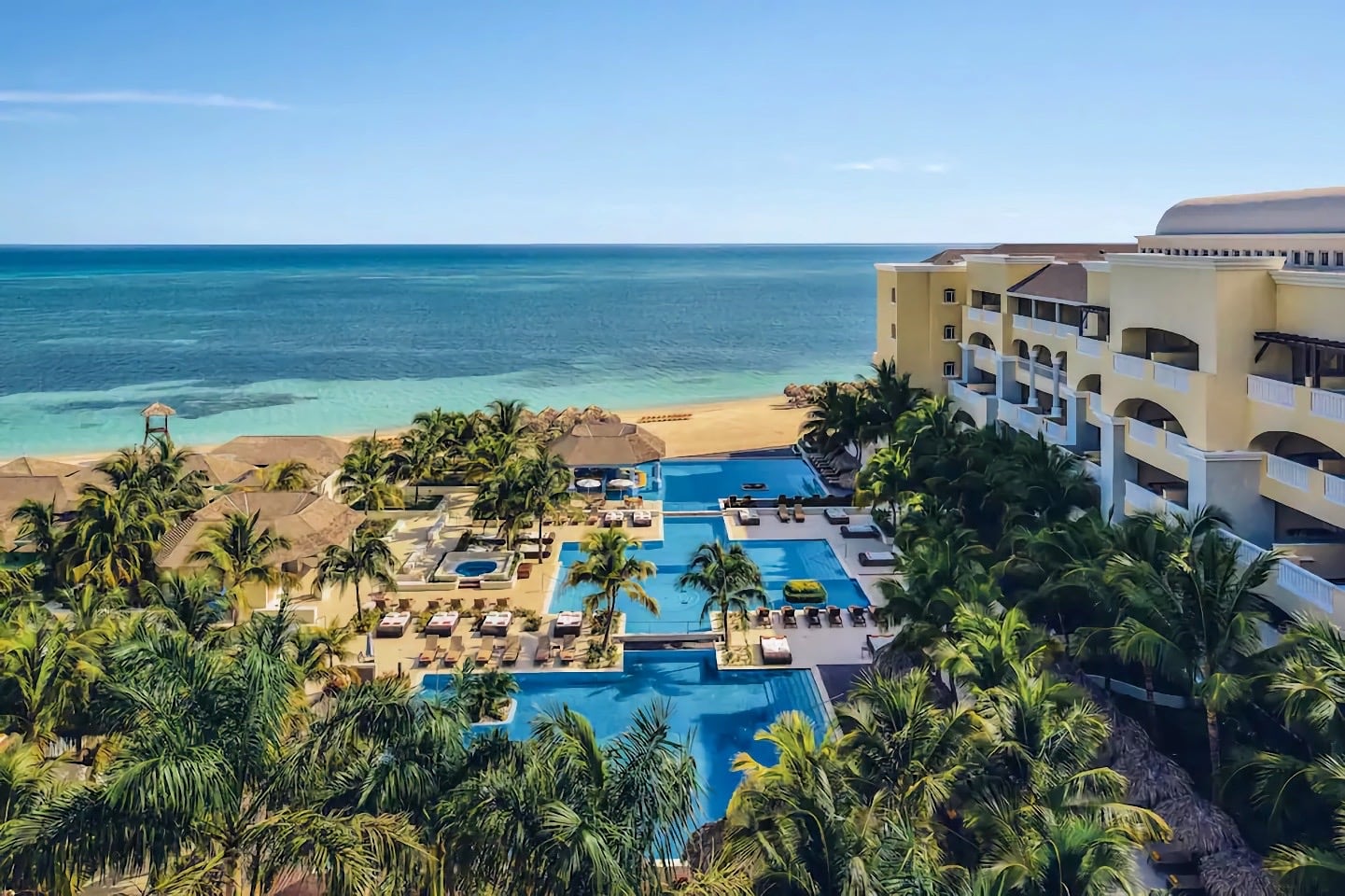 luxury hotel on the beach with large pool