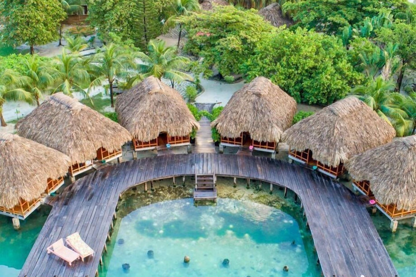 thatch huts over water