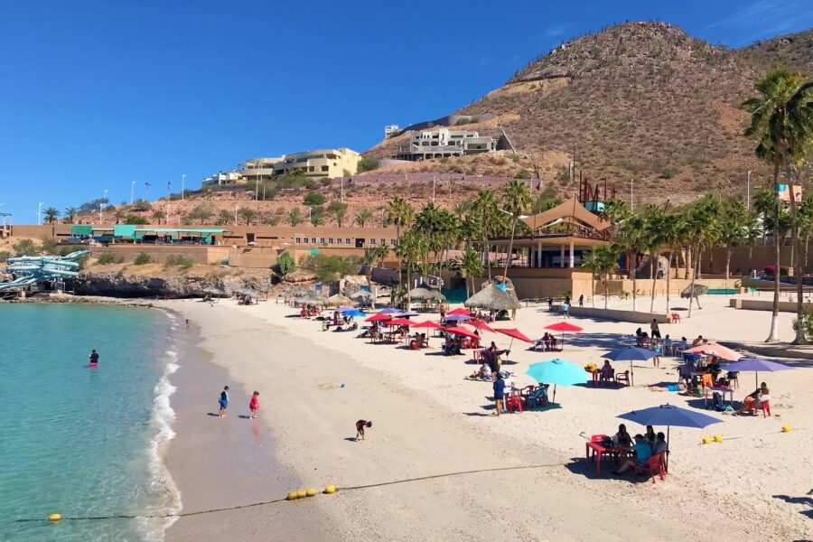 people on beach in La Paz Mexico