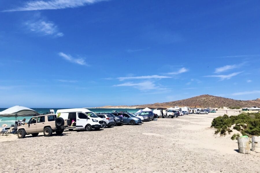 vehicles parked on beach Playa El Tecolote La Paz beaches