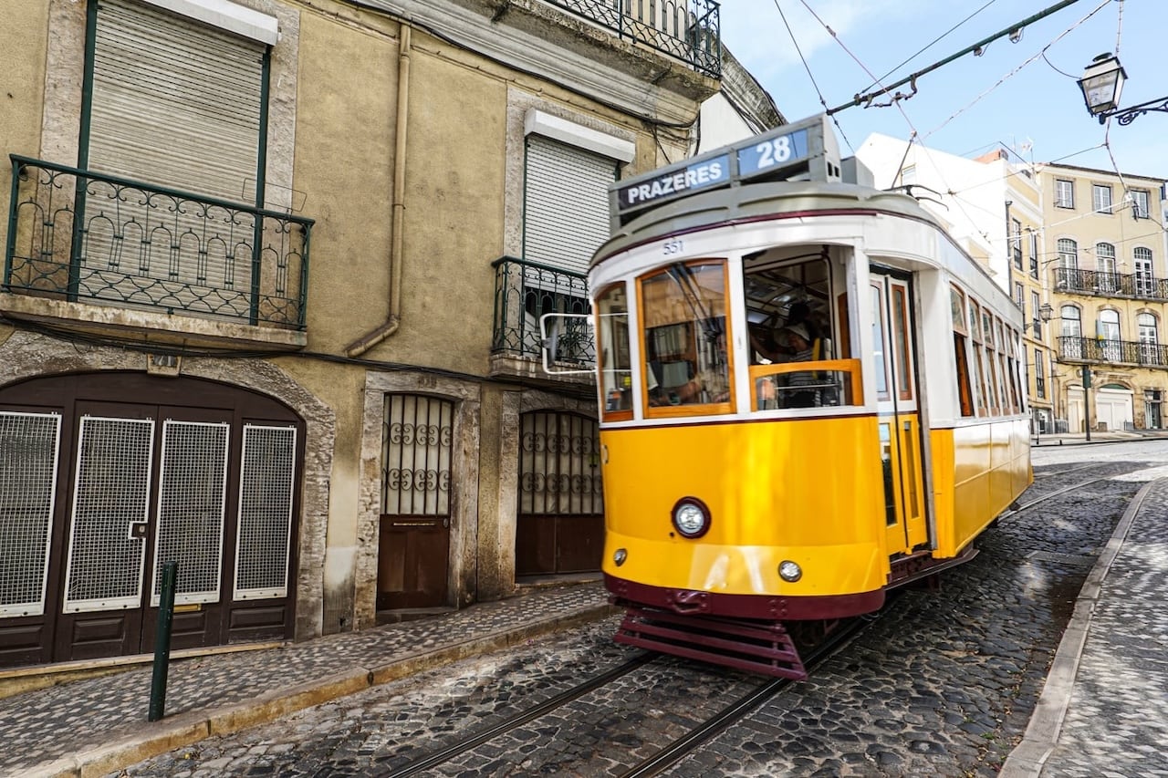 yellow and white tram in Lisbon Portugal