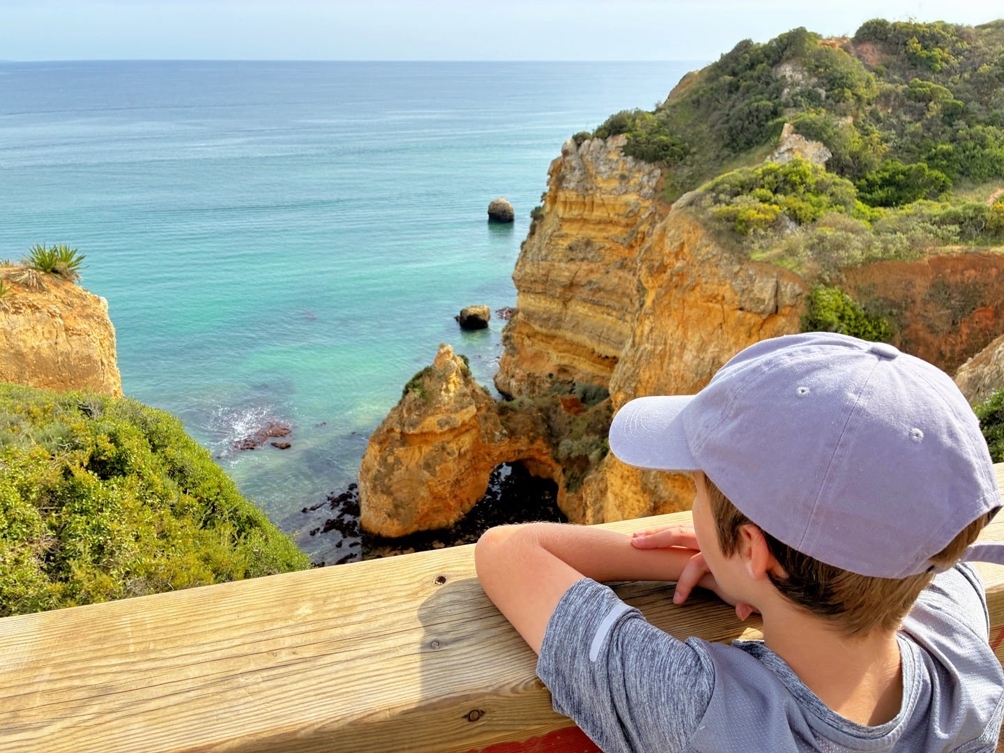 boy looking out at ocean