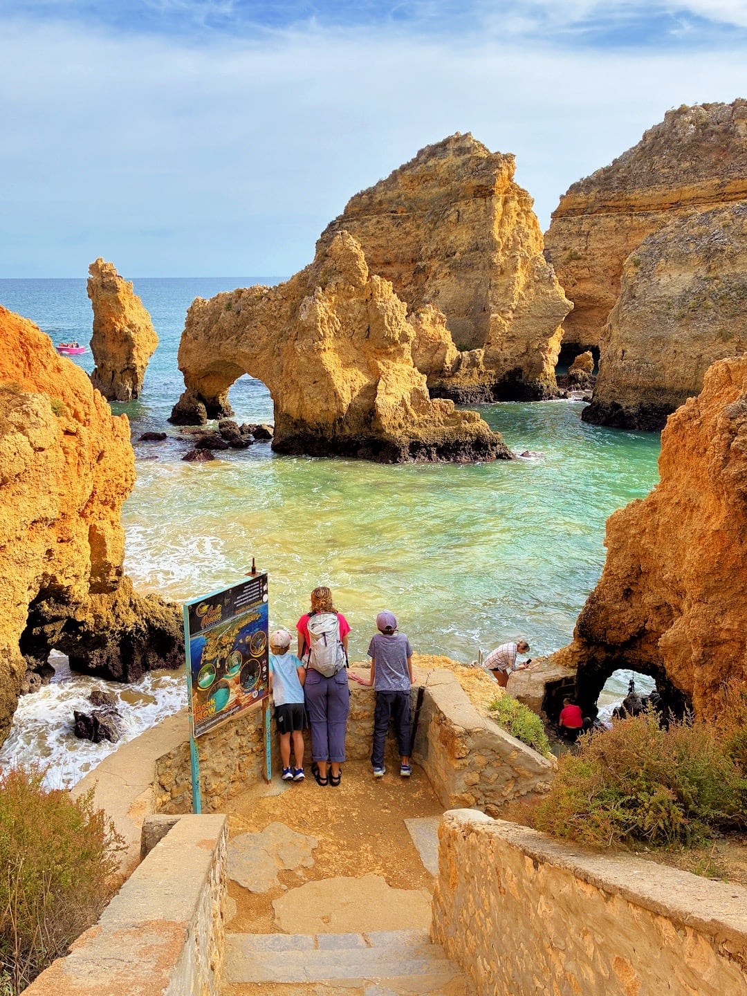 family viewing Ponta da Piedade arches