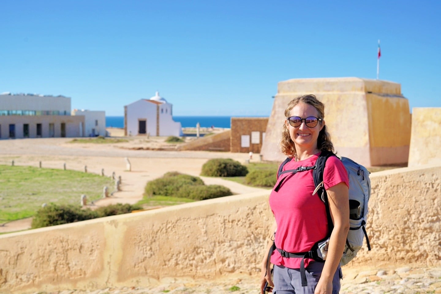 woman standing at Fortaleza de Sagres Portugal