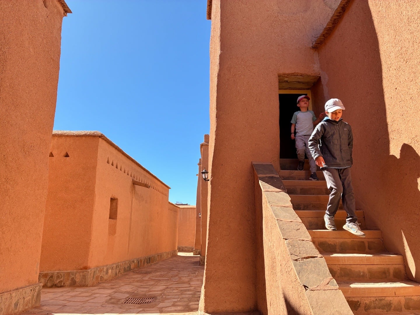 visitors walking steps in Taourirt Kasbah