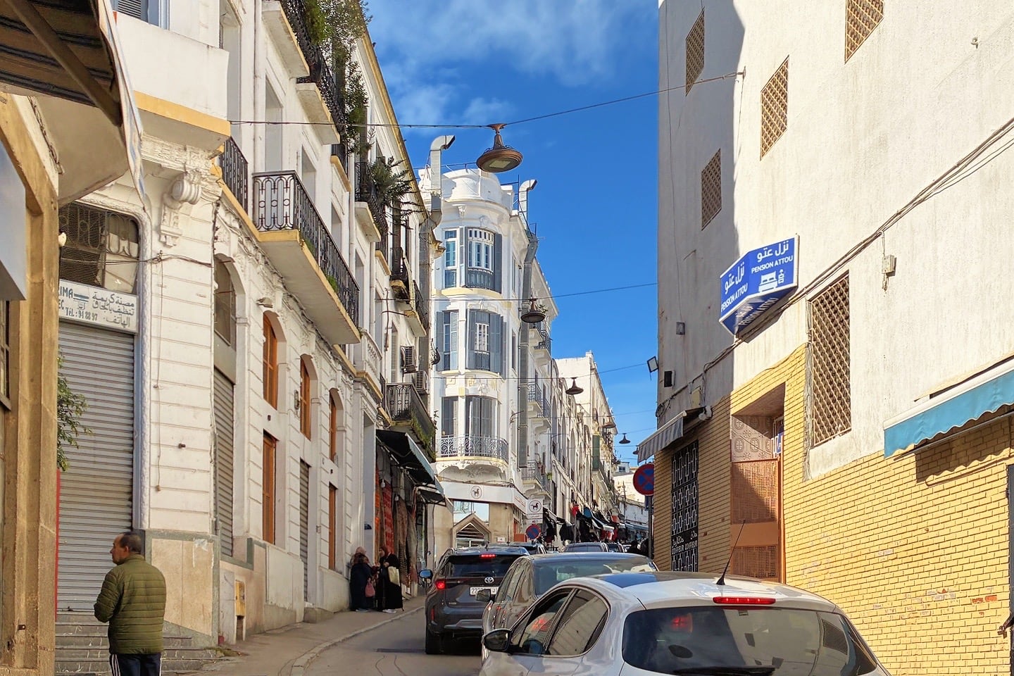cars lined up on road in Tangier